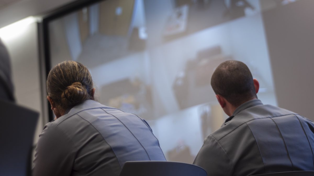 Cadets of the Saint Louis County and Municipal Police Academy watching a scene unfold in a simulated child welfare check, St. Louis, Oct 1, 2024.