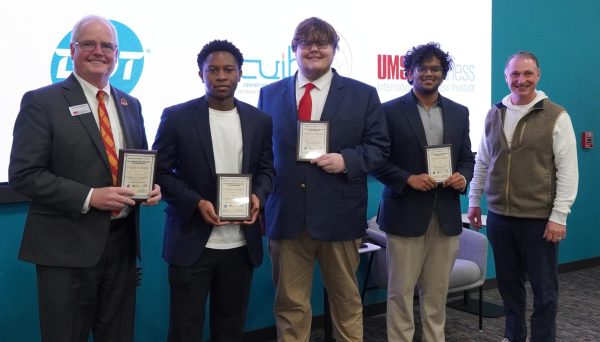 UMSL students with their plaque awards 